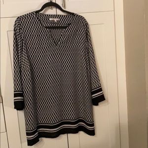 Black/white tunic.  V-neck and sheer fabric.